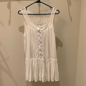 White sleeveless dress with lace details